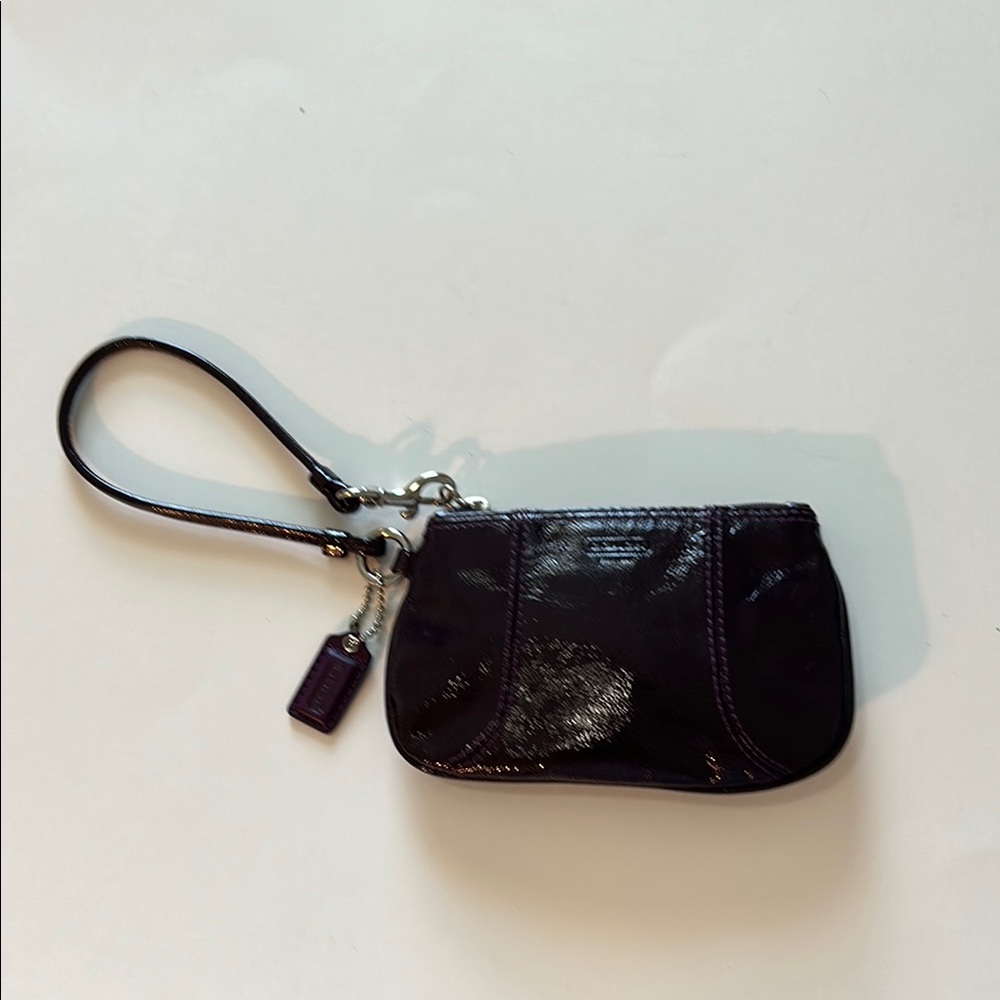 EUC Coach patent leather wristlet in dark purple or plum color and silver metal - Picture 2 of 10